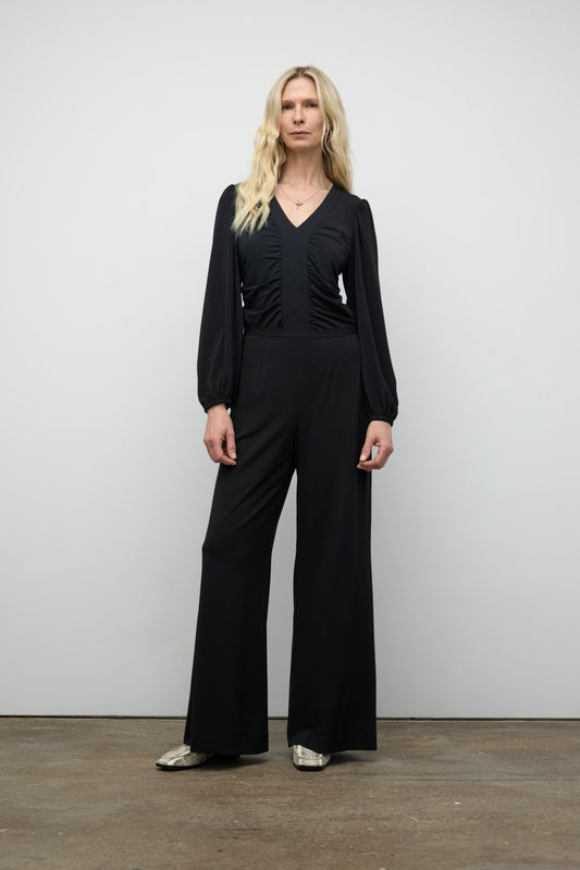 Long sleeve top with roushing