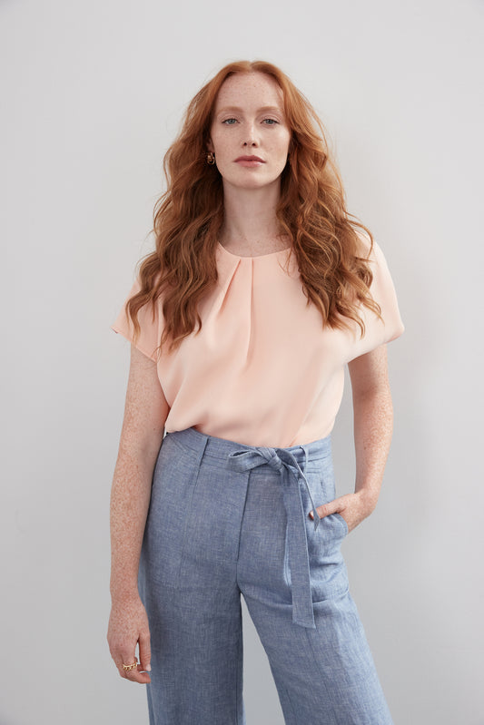 Cap sleeve top with pleats at neckline