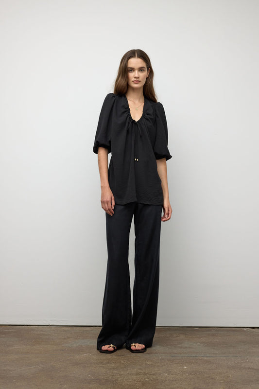 Haut avec manches bouffantes