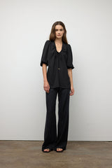 Haut avec manches bouffantes