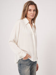 Long sleeve button front blouse with gathered yoke details