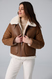 Veste réversible en sherpa et matelassée