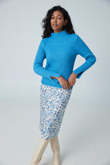 Col roulé avec côtes