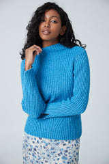 Col roulé avec côtes