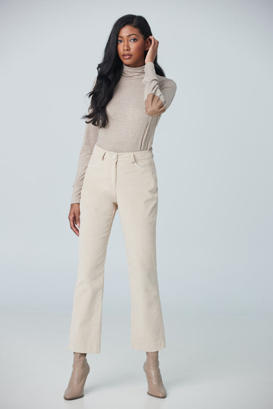 Turtleneck with faux suede elbow patch