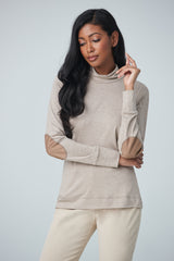 Turtleneck with faux suede elbow patch